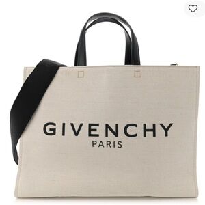 Brand new Givenchy linen tote with leather handles
. Pocket inside